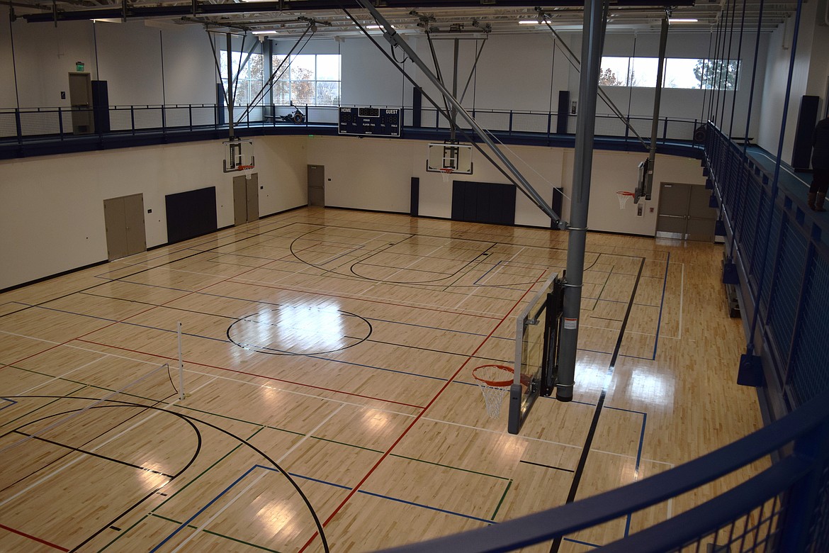 The floor of the Larson Recreation Center gym is marked for full-court basketball (black), half-court basketball (blue), full-court volleyball (red), half-court volleyball (white) and pickleball (green).Pickleball was designated as the Washington state sport earlier in 2022.