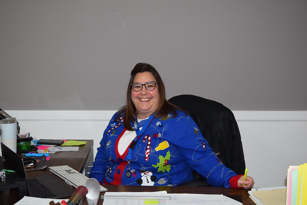 Cecilia Johnson - who is constantly making sure ads are ready to roll and that the rest of us are organized - smiles at the camera the week before Christmas. Cecilia participated in our ... interesting ... sweater week. She wishes all of the Basin a wonderful holiday season and a successful 2023.