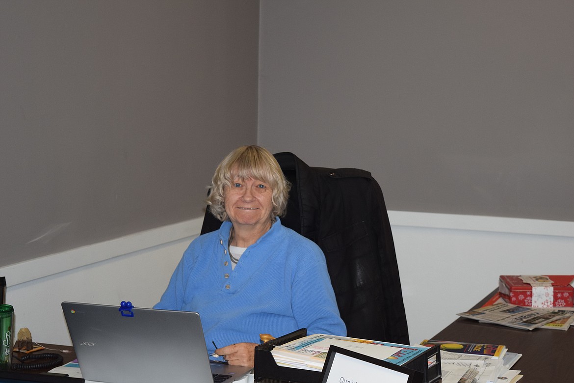 Senior Reporter Cheryl Schweizer pauses in typing up a story - probably about health care - for a quick picture. Cheryl is a Pacific Northwest native and has come to love working in the Columbia Basin. She is also a fan of the boss's chocolate dish.