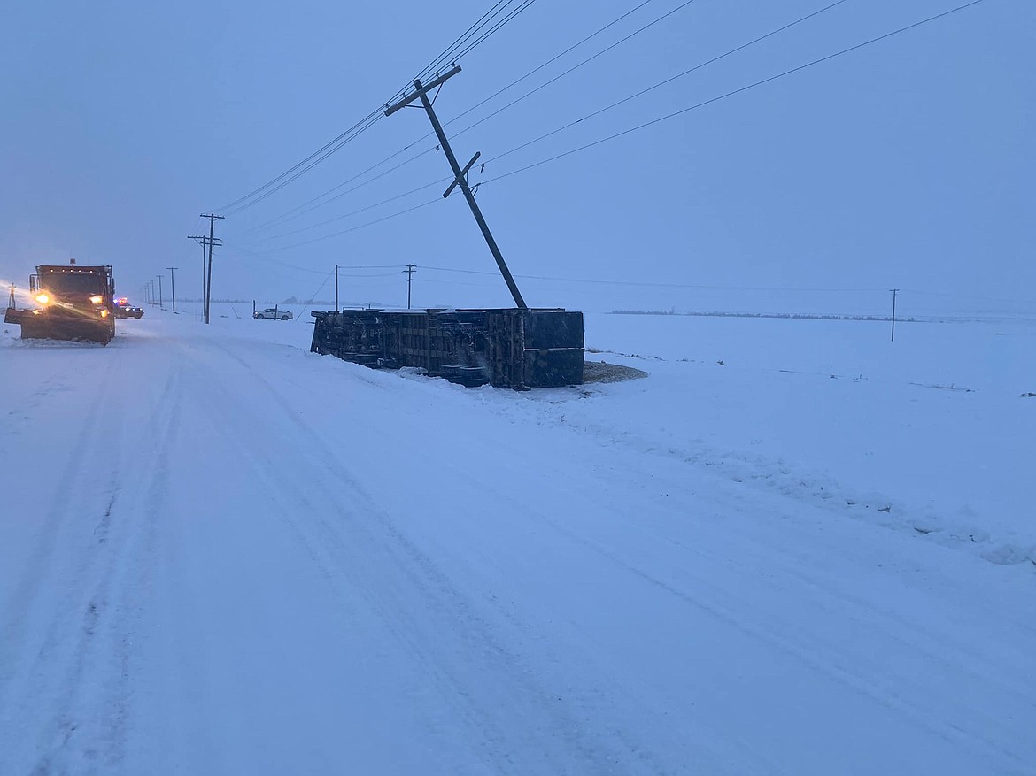 A truck slid off the road and hit a power pole early Friday morning near Othello