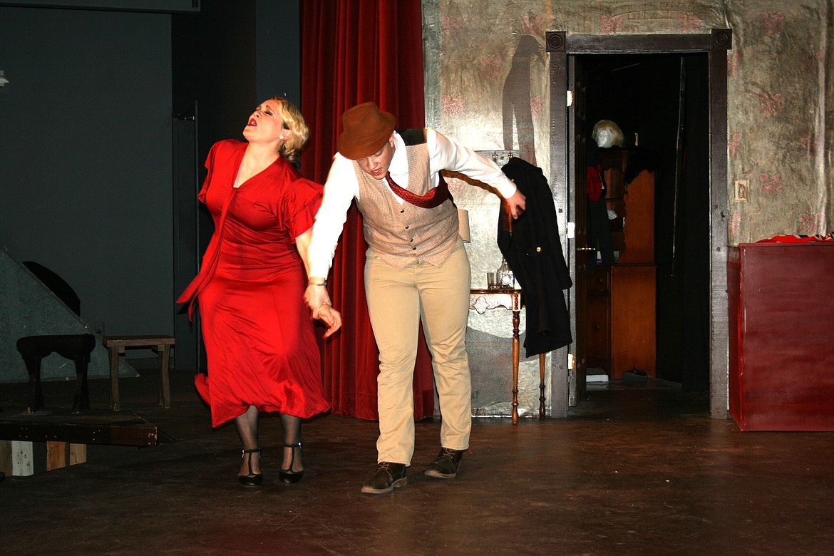 Cecily Hendricks, left, and Miles Plagerman, right, try to escape the bad guys the Masquers Theater production of “The 39 Steps” in June. The theater will be holding auditions for “Sing On” Jan. 6 and 7.