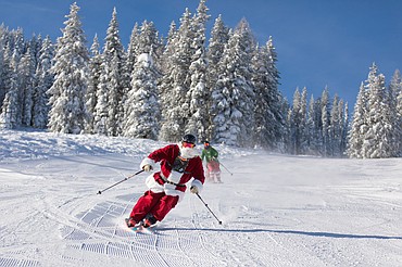 Santas hit the slopes last week at Lookout Pass for the mountain's annual Dress Like Santa Day. The event raises funds for groups that help kids, like Toys for Tots.