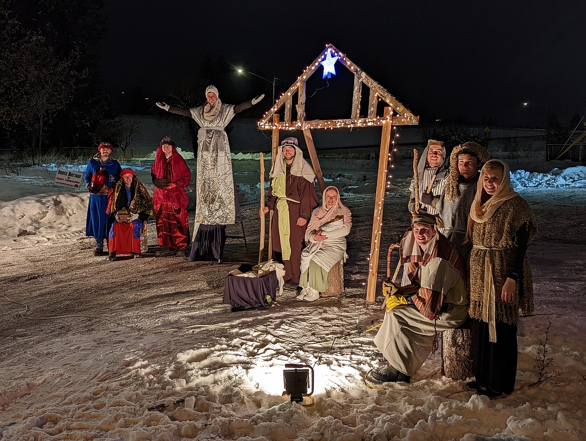 A jolly group of friends in Post Falls set up a nativity scene Monday night along Spokane Street near Terre Coffee. (Photo by Chanse Watson)