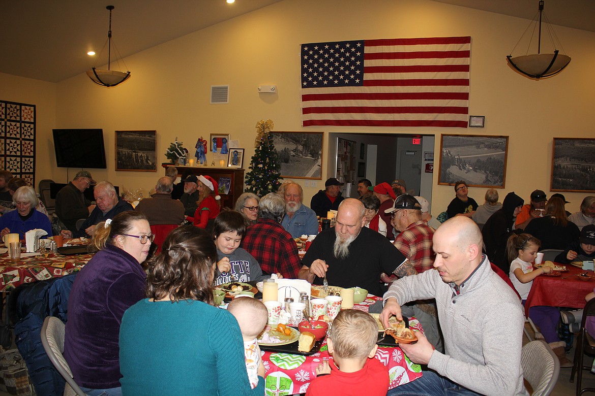 Delicious food and camaraderie were enjoyed at the packed St. Regis Senior Citizens Center on Thursday for Christmas dinner. (Monte Turner/Mineral Independent)