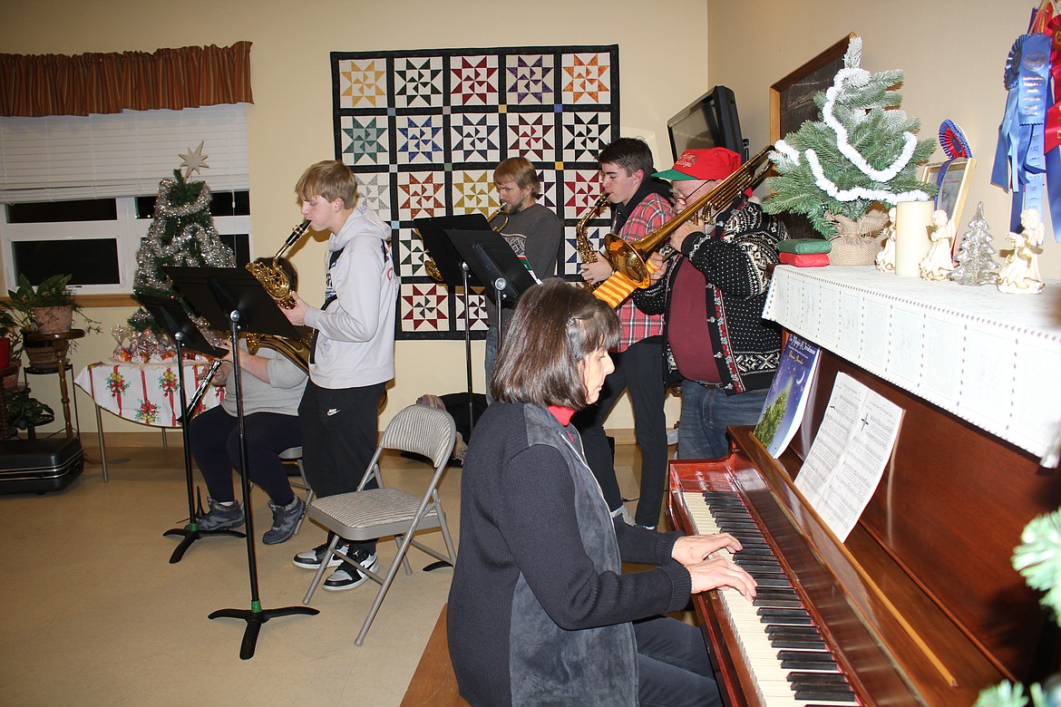 Christmas music for the evening was provided by St. Regis students, alumni and residents. (Monte Turner/Mineral Independent)