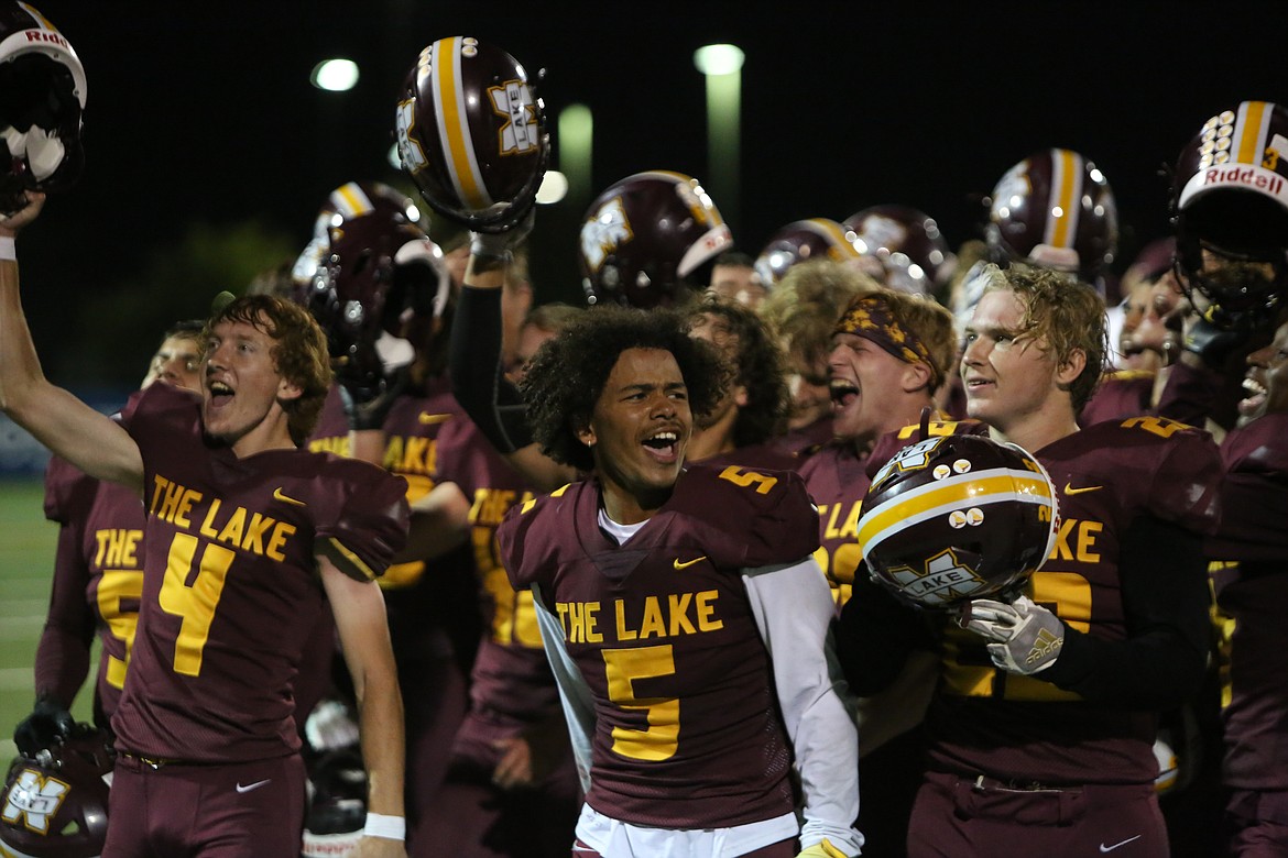 Moses Lake wide receiver/defensive back Kyson Thomas celebrates with teammates after a Maverick win.