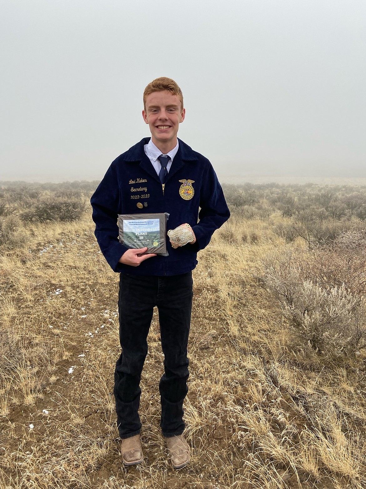 Quincy High School’s Levi Kukes displays his first-place awards in the FFA Western National Rangeland contest.