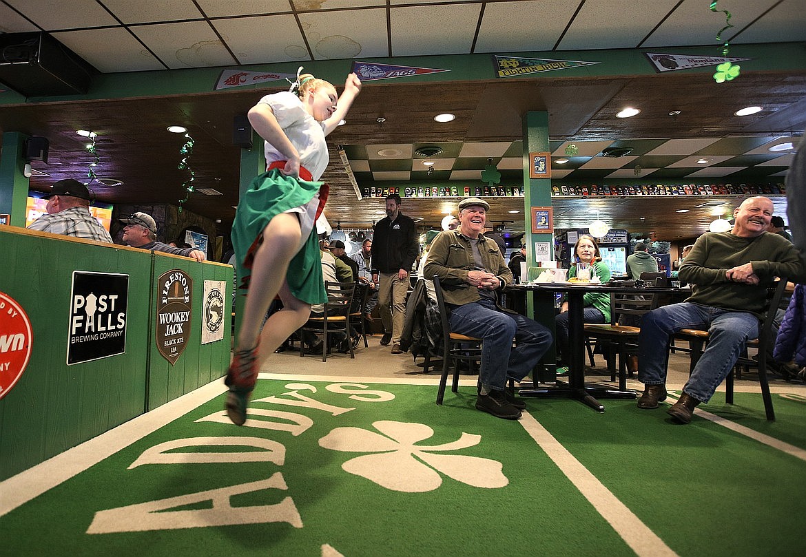 Talie Hawkins leaps as she dances with the Lake City Highland Dancers at Paddy's Sports Bar on St. Patrick's Day.