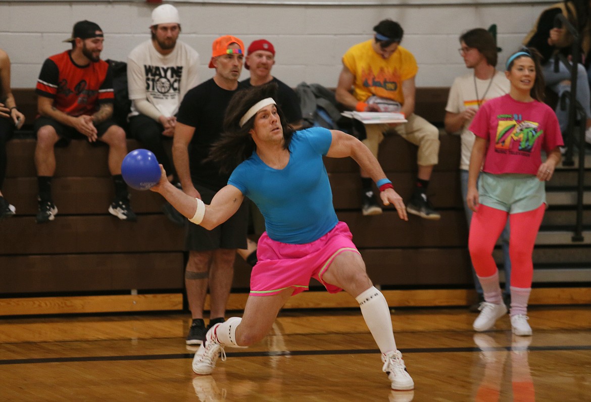 Brooks Goff of Hayden pulls off a killer throw — and '80s costume — Nov. 18 during the 14th annual Wild Turkey Dodgeball Tournament in Post Falls.