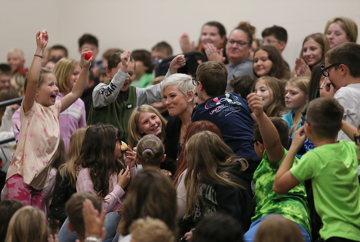 Students cheer for Treaty Rock Elementary third grade teacher Karen Lauritzen the morning of Sept. 29 after the surprise announcement that she is the 2023 Idaho Teacher of the Year.