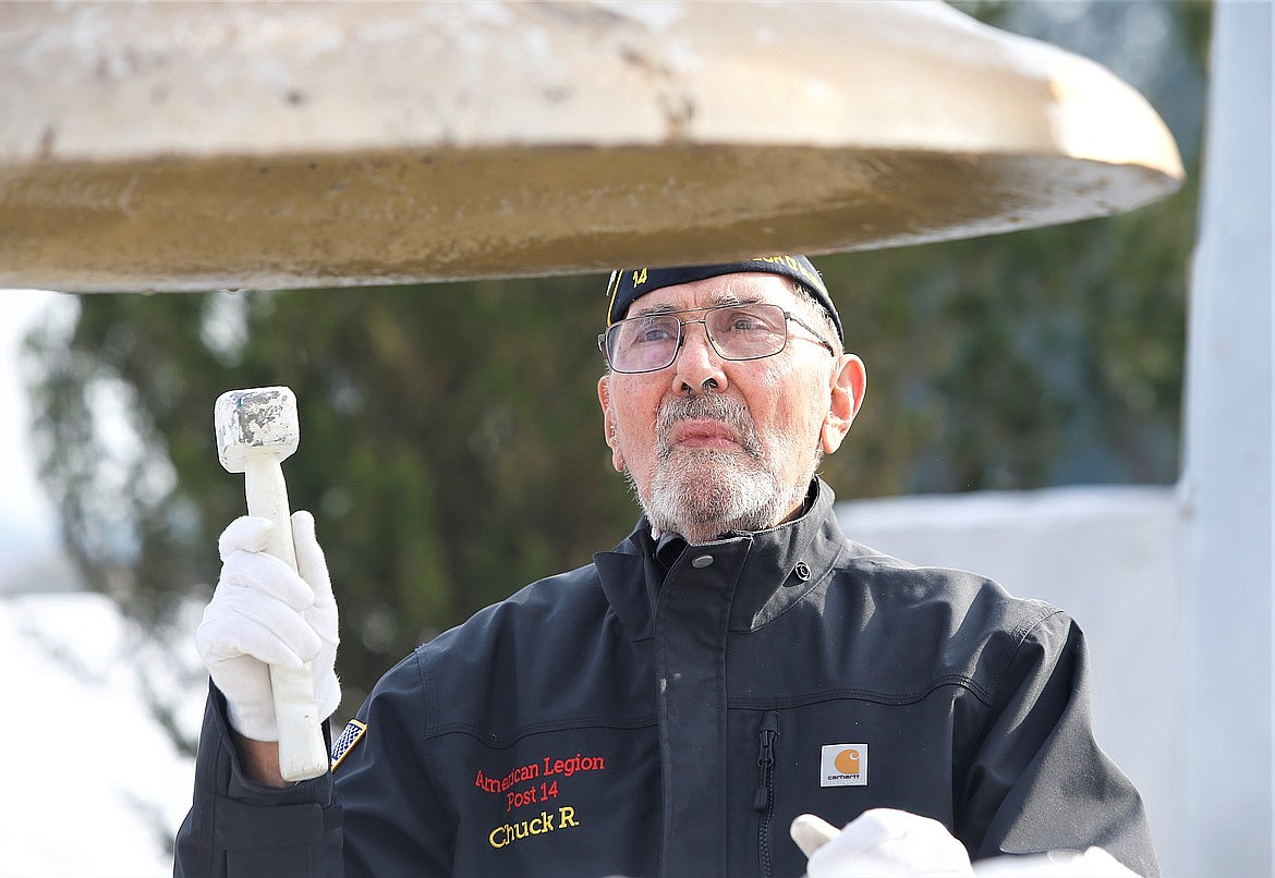 Charles Riffel rings the bell at the Tomb of the Unknown Soldier at McEuen Park during a Veterans Day ceremony.