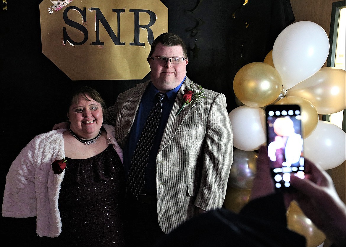 Amber and Jeremy pose for photos at the Specialized Needs Recreation prom in May at St. Pius X Catholic Church.