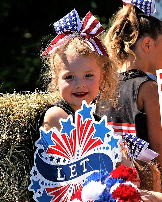 Finnley Bozeman of Coeur d'Alene smiles during the Rathdrum Days Parade.