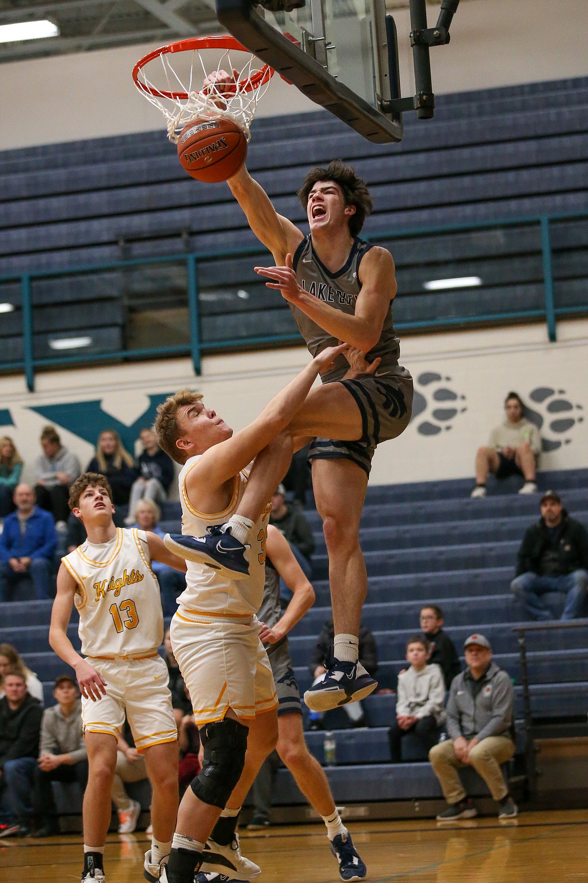 JASON DUCHOW PHOTOGRAPHY
Lake City senior Blake Buchanan throws down a dunk during Thursday's game against visiting Bishop Kelly of Boise.