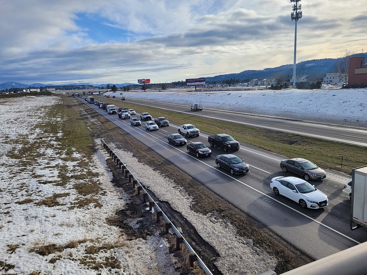 Traffic begins to back up on westbound I-90 as police respond to an incident Thursday morning in Post Falls.