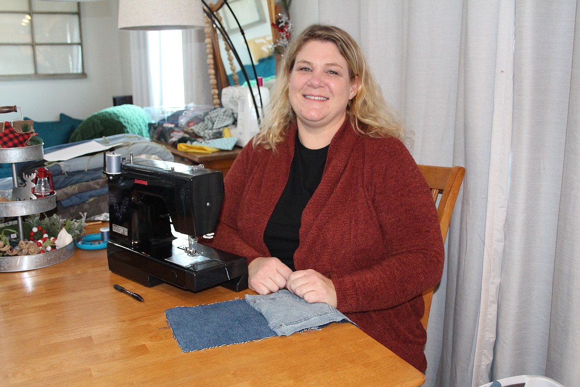 Keri Perez takes old jeans and makes them into new quilts.