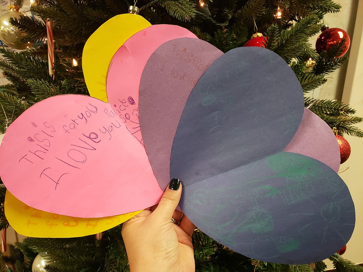 For Amelia Snyder’s seventh birthday, she chose to make cards for Moses Lake Police officers, pictured.