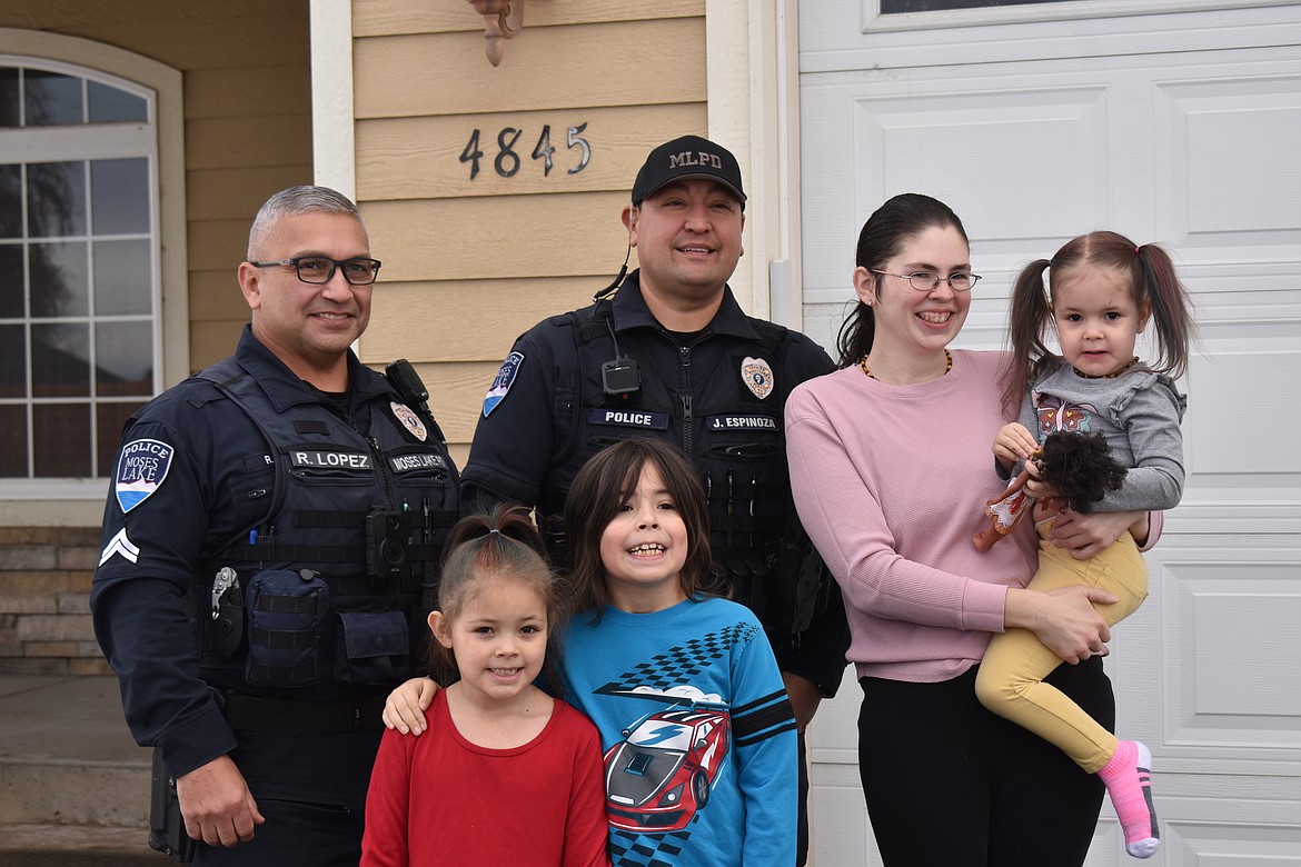 From left: MLPD Officer Ray Lopez, Officer Joaquin Espinoza, Kathryn Snyder, Bridget Snyder, Amelia Snyder and Zachary Snyder.