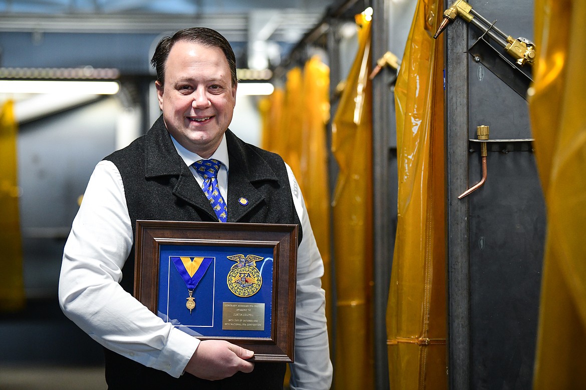 Justin Heupel, Kalispell FFA adviser and agricultural education teacher at the H.E. Robinson Ag Center on Friday, Dec. 30. Heupel is the recipient of the Honorary American FFA Degree, the highest degree given to an individual by the National FFA Organization. (Casey Kreider/Daily Inter Lake)