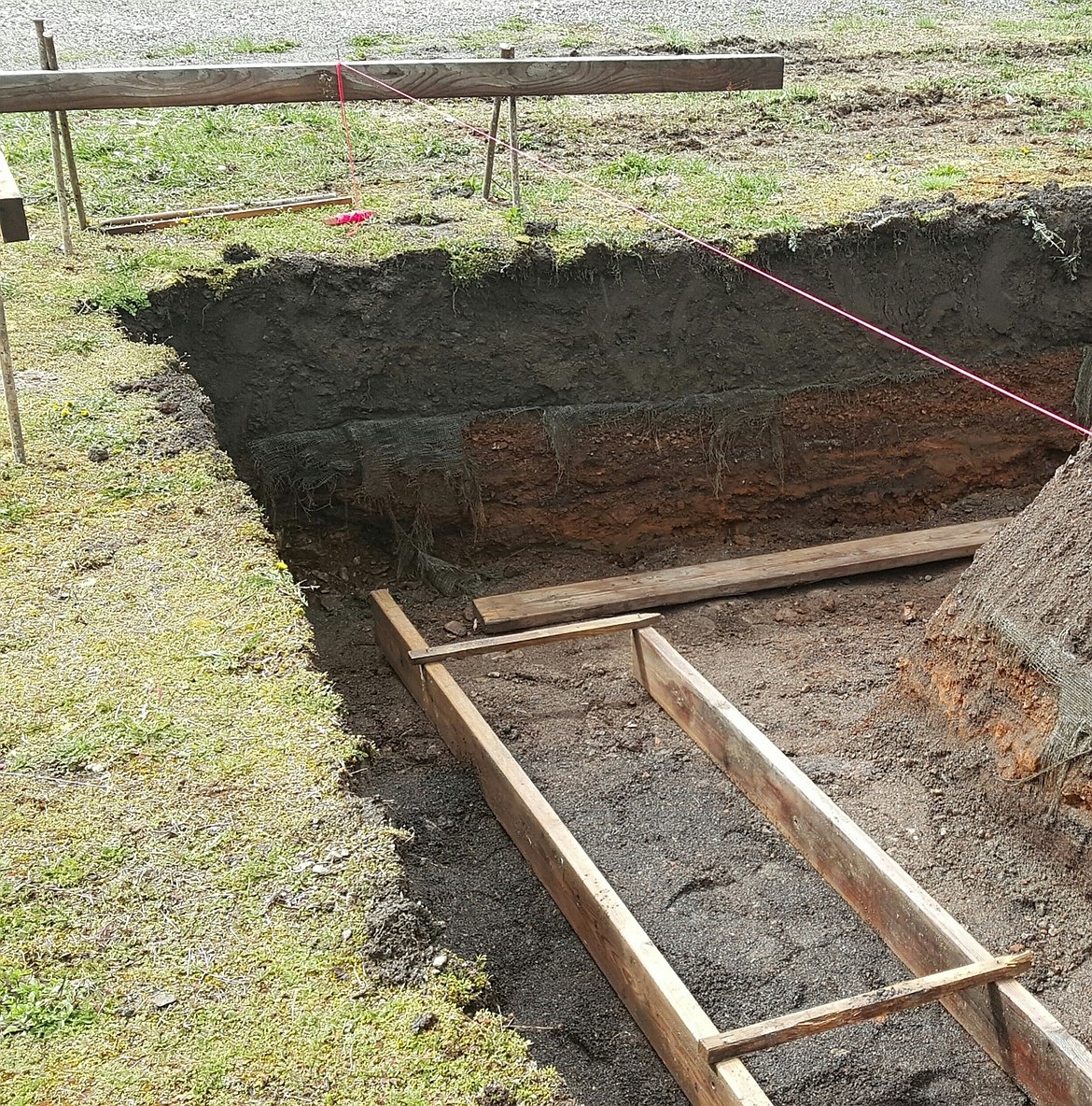 12-inch "clean" soil barrier capping contaminated soils beneath.