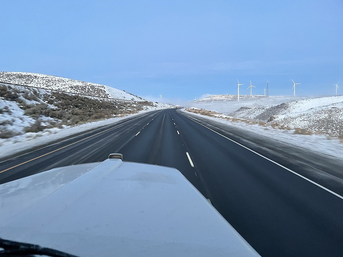 A view of I-90 west of Vantage from the cab of Theron Wood's semi-tractor trailer with patches of freezing fog in the distance.