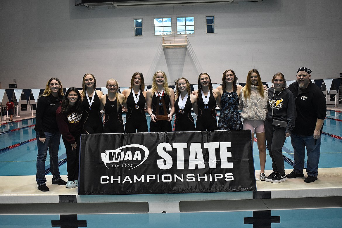 In Jason Hart’s, right,  first year as head coach of the boys and girls Maverick swim teams, the girls placed fourth at the 4A state meet in November.