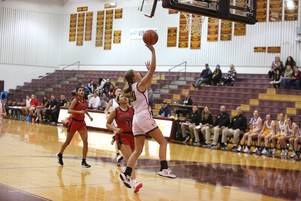 Moses Lake senior Sydney Macdonald runs down the floor on a fastbreak to score on a layup in the fourth quarter of the Maverick’s 53-32 win over Othello on Friday.