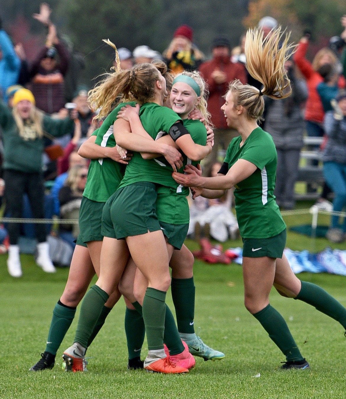 Whitefish players celebrate a second-half goal by Brooke Roberts in the the State A final. (Whitney England/Whitefish Pilot)