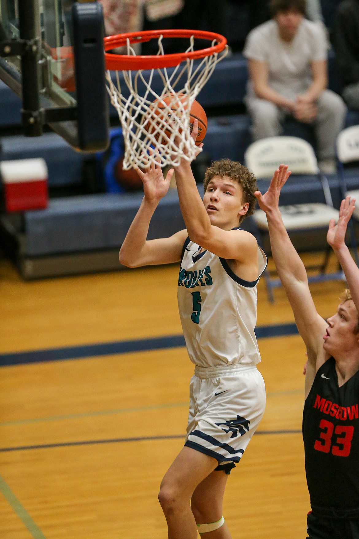 JASON DUCHOW PHOTOGRAPHY
Deacon Kiesbuy (5) of Lake City goes up for a shot as Zac Skinner (33) of Moscow defends on Tuesday night at Lake City.