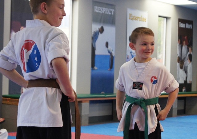 Nathan and Justice partnering up for self defense on belt testing day at Sandpoint Martial Arts.