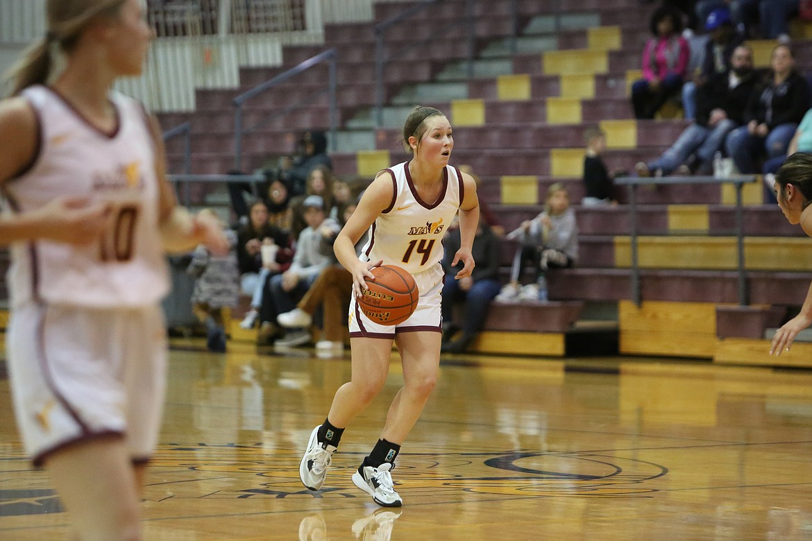 Moses Lake junior Lexi Cox takes the ball up the floor against Othello on Friday. The Mavericks will return to their home floor against Eisenhower on Friday at 5:45 p.m.