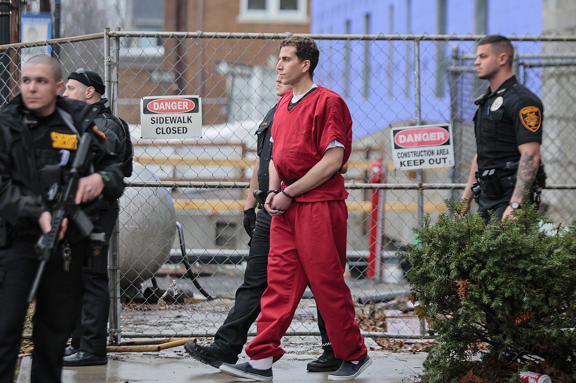 Bryan Kohberger, who faces first-degree murder charges in the deaths of four University of Idaho students last fall, is taken by sheriff's deputies from the Monroe County Courthouse in Stroudsburg, Pa., on Tuesday.