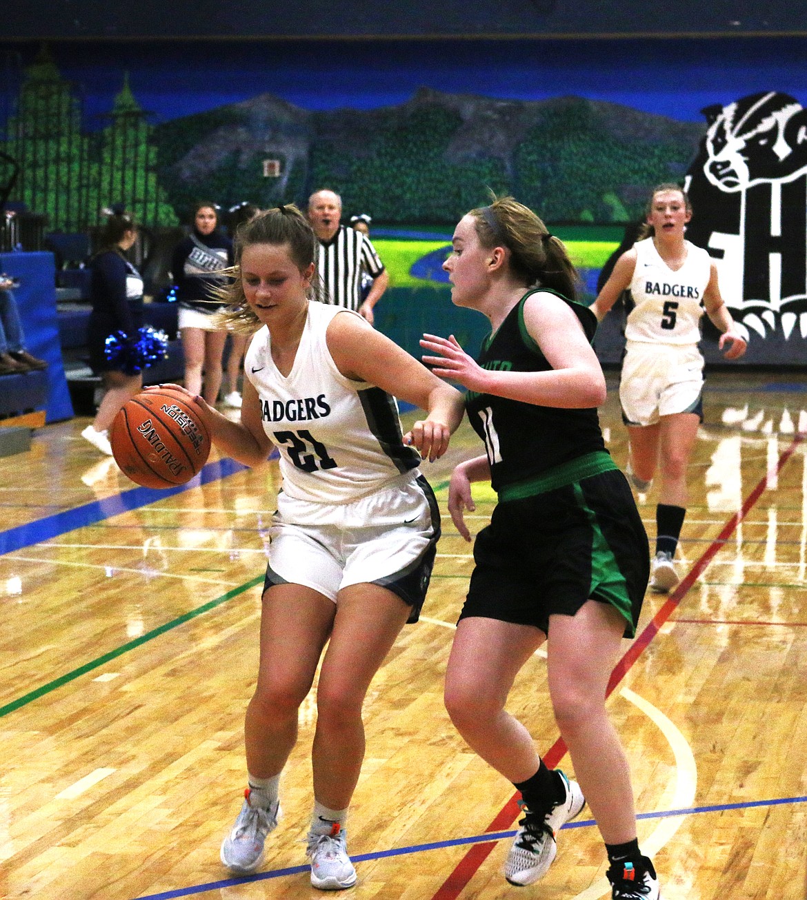 Braylyn Bayer drives to the hoop against the East Valley Knights on Jan. 3.