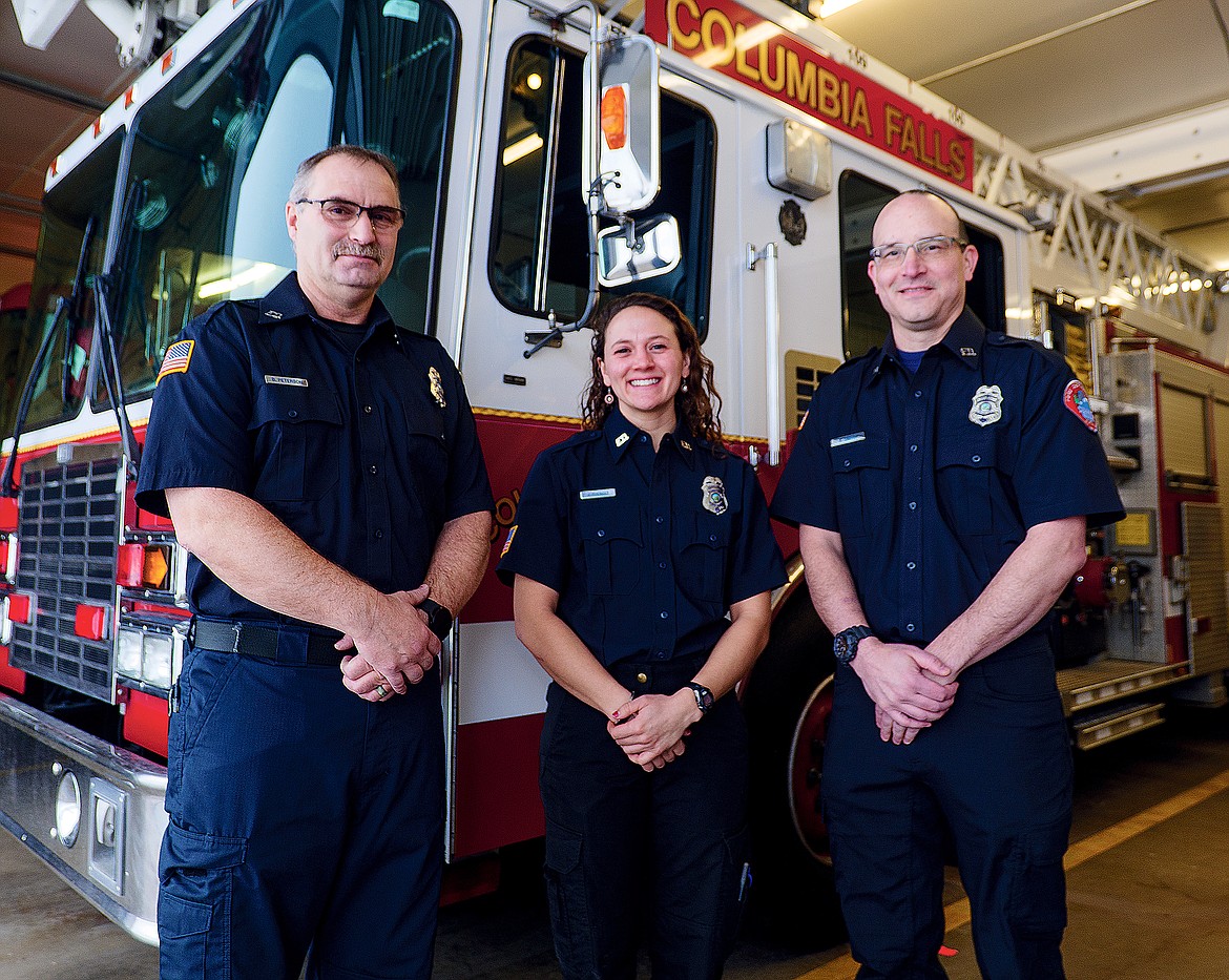 From left, Columbia Falls firefighters Brad Peterson, Jade Thomas and Ryan Smith. The three are the first paid firefighters in the city’s history outside of the fire chief. (Hungry Horse News)