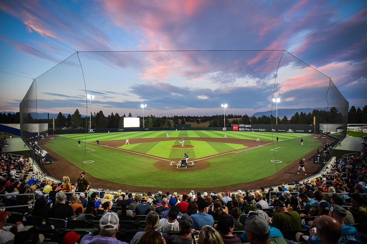 The sun sets over Flathead Field as the Glacier Range Riders host their last home game of the season against the Great Falls Voyagers on Wednesday, Sept. 7. (Casey Kreider/Daily Inter Lake)