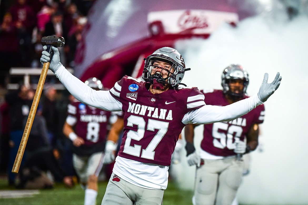 Grizzlies cornerback Trevin Gradney (27) leads Montana out onto the field before an FCS playoff game against Southeast Missouri State at Washington-Grizzly Stadium on Saturday, Nov. 26. (Casey Kreider/Daily Inter Lake)