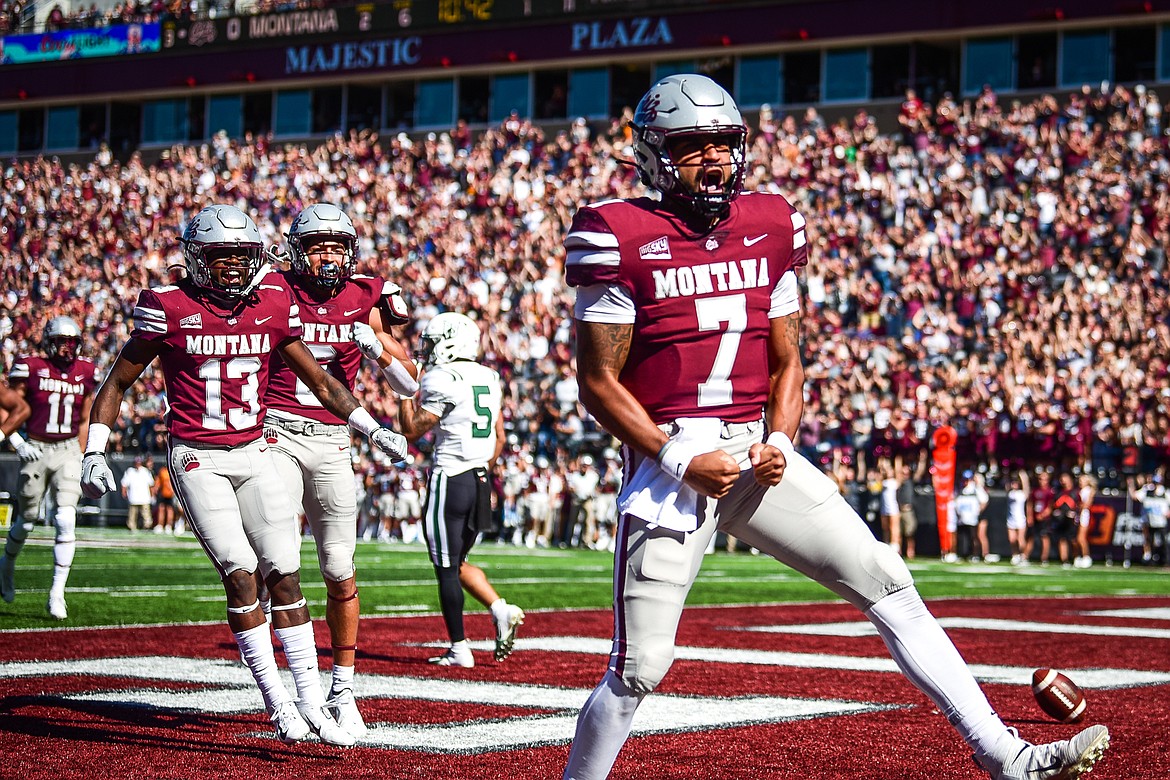 Montana quarterback Lucas Johnson (7) celebrates after an 11-yard touchdown run in the first quarter against Portland State at Washington-Grizzly Stadium on Saturday, Sept. 24. (Casey Kreider/Daily Inter Lake)
