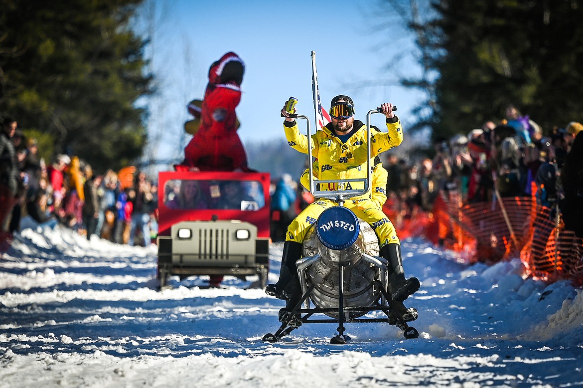 Competitors race down Sugar Hill at the Barstool Ski Races during the 43rd annual Cabin Fever Days in Martin City on Saturday, Feb. 12. (Casey Kreider/Daily Inter Lake)