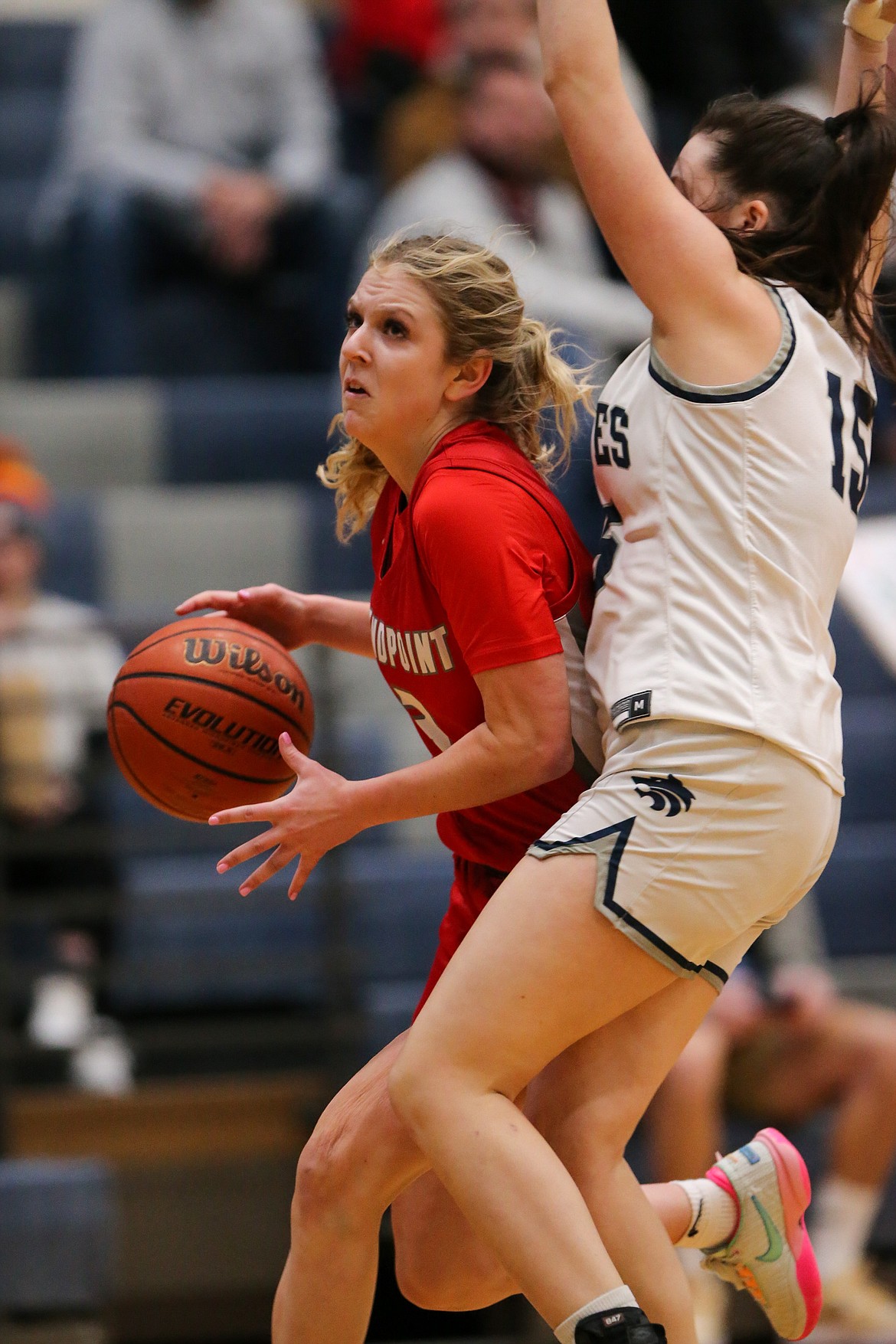 Daylee Driggs drives in for a basket against Lake City.