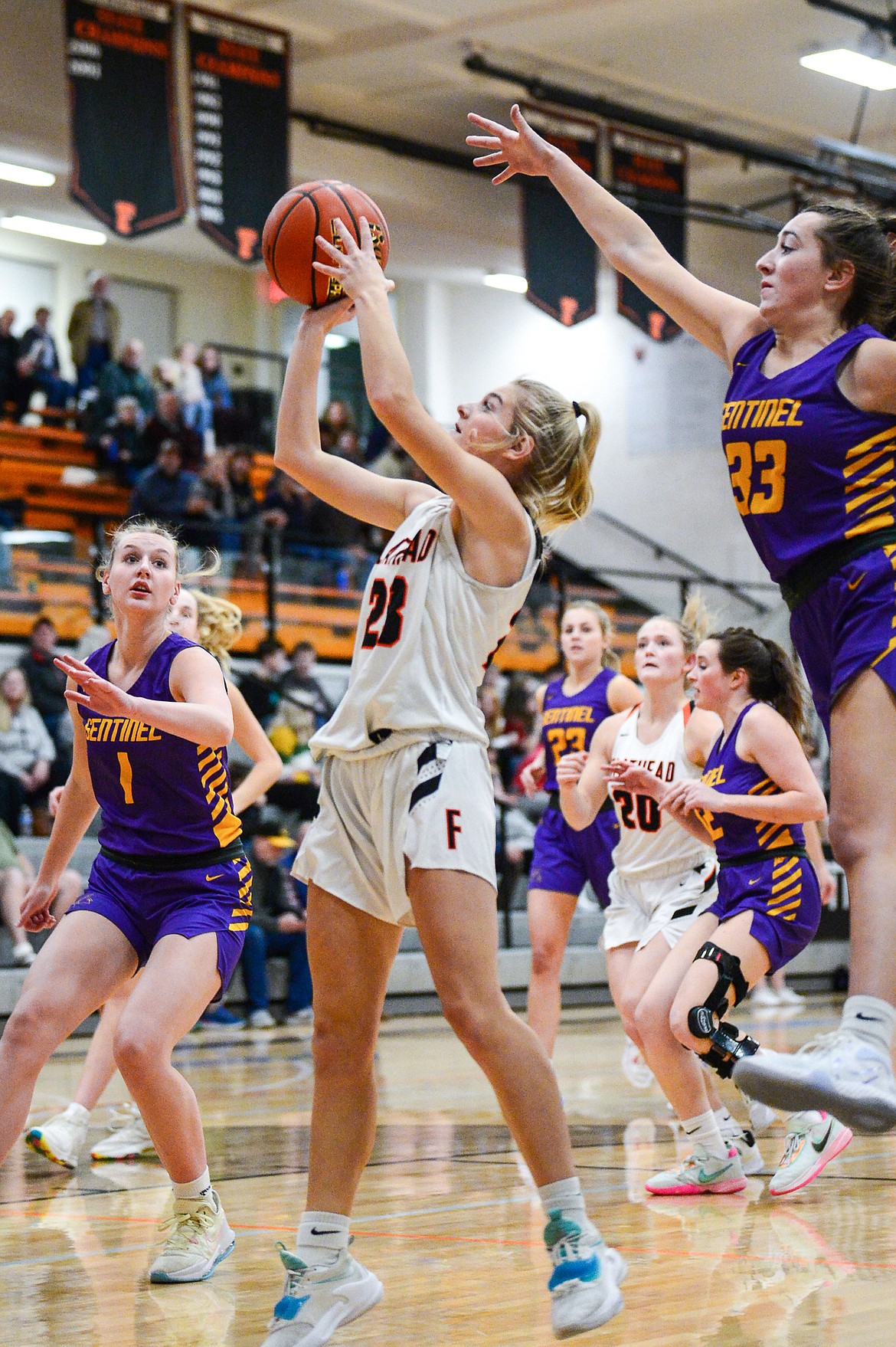 Flathead's Celie Vandenbosch (23) drives to the basket in the first half against Missoula Sentinel at Flathead High School on Friday, Jan. 6. (Casey Kreider/Daily Inter Lake)