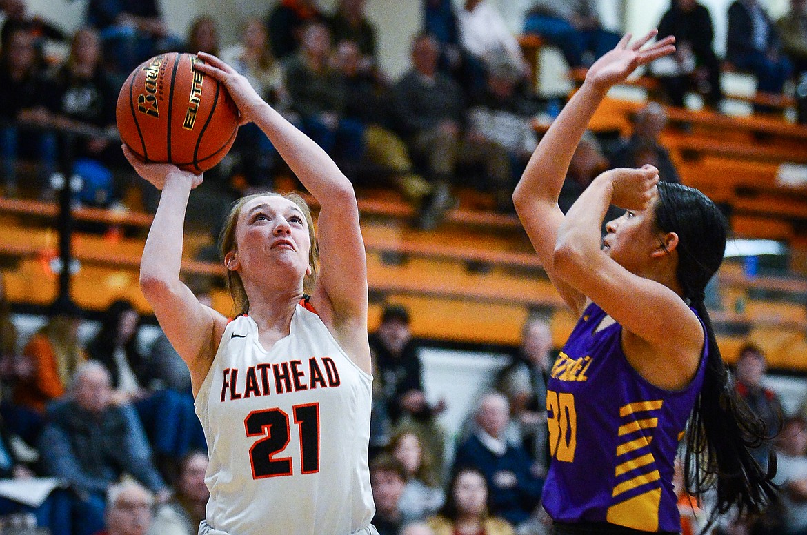 Flathead's Harlie Roth (21) looks to shoot in the first half against Missoula Sentinel at Flathead High School on Friday, Jan. 6. (Casey Kreider/Daily Inter Lake)