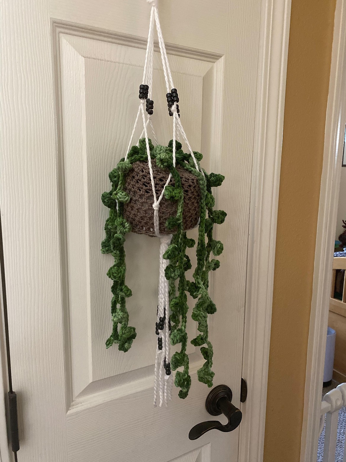 Connie Klimes makes hanging crocheted plants for her daughter and her college friends at Krafty Krafters. Group meetings are at 1 p.m. on Fridays in the Hayden Senior Center, at its new location on Lancaster Road.