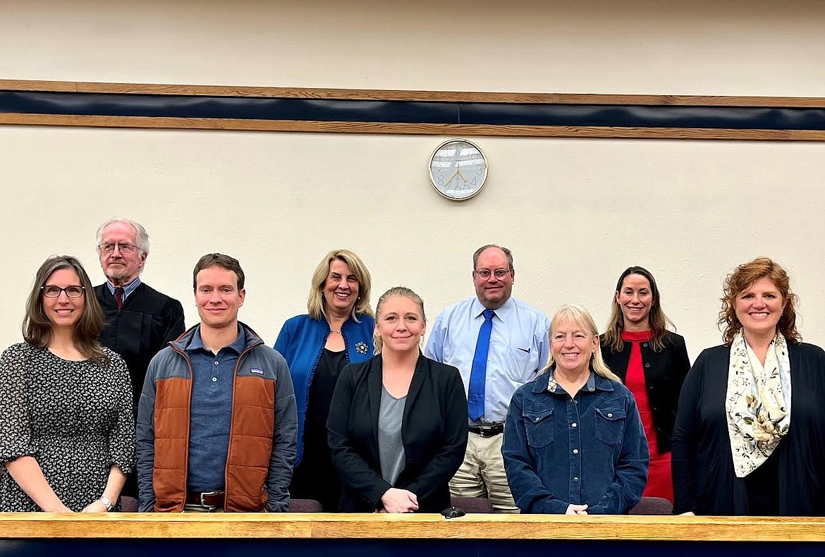 Pictured back row left to right: District Judge Robert B. Allison, District Judge Heidi J. Ulbricht, District Judge Dan Wilson and District Judge Danni Coffman; front row Camie Anderson, Bryan Bowman, Anna Mahlen, Christine Degenhardt and Angela Tollerson (photo courtesy of CASA for Kids).