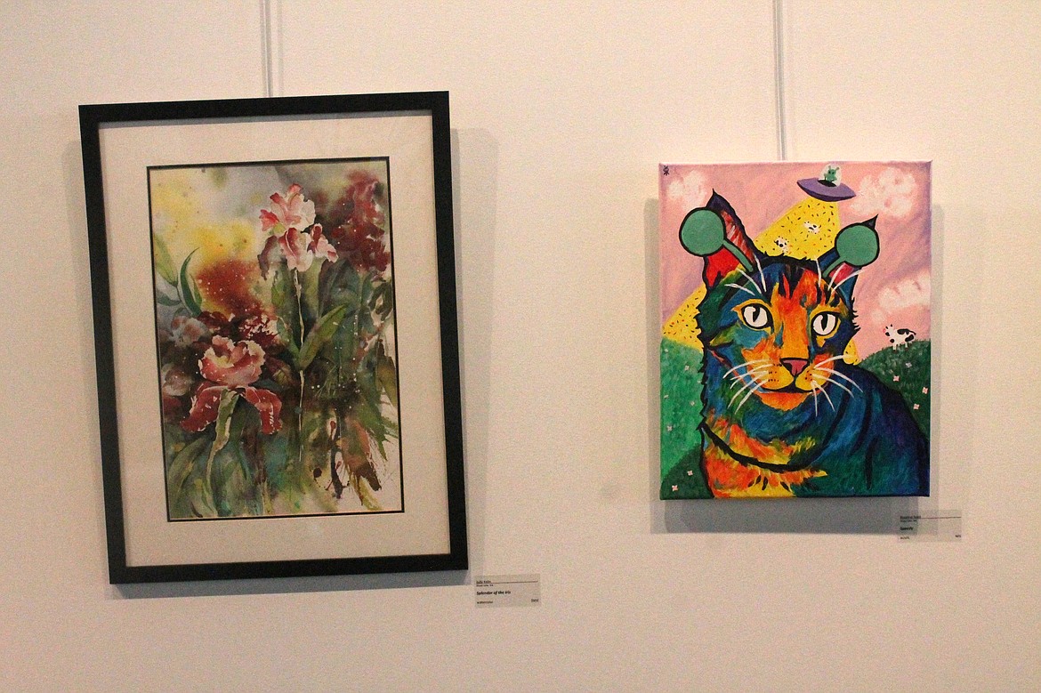 “Splendor of the Iris,” a watercolor by Moses Lake’s Judy Kalin, and “Speedy,” an acrylic of artist Rosalind Reed’s beloved but departed kitty, are part of the Members Exhibition at the Moses Lake Museum & Art Gallery.