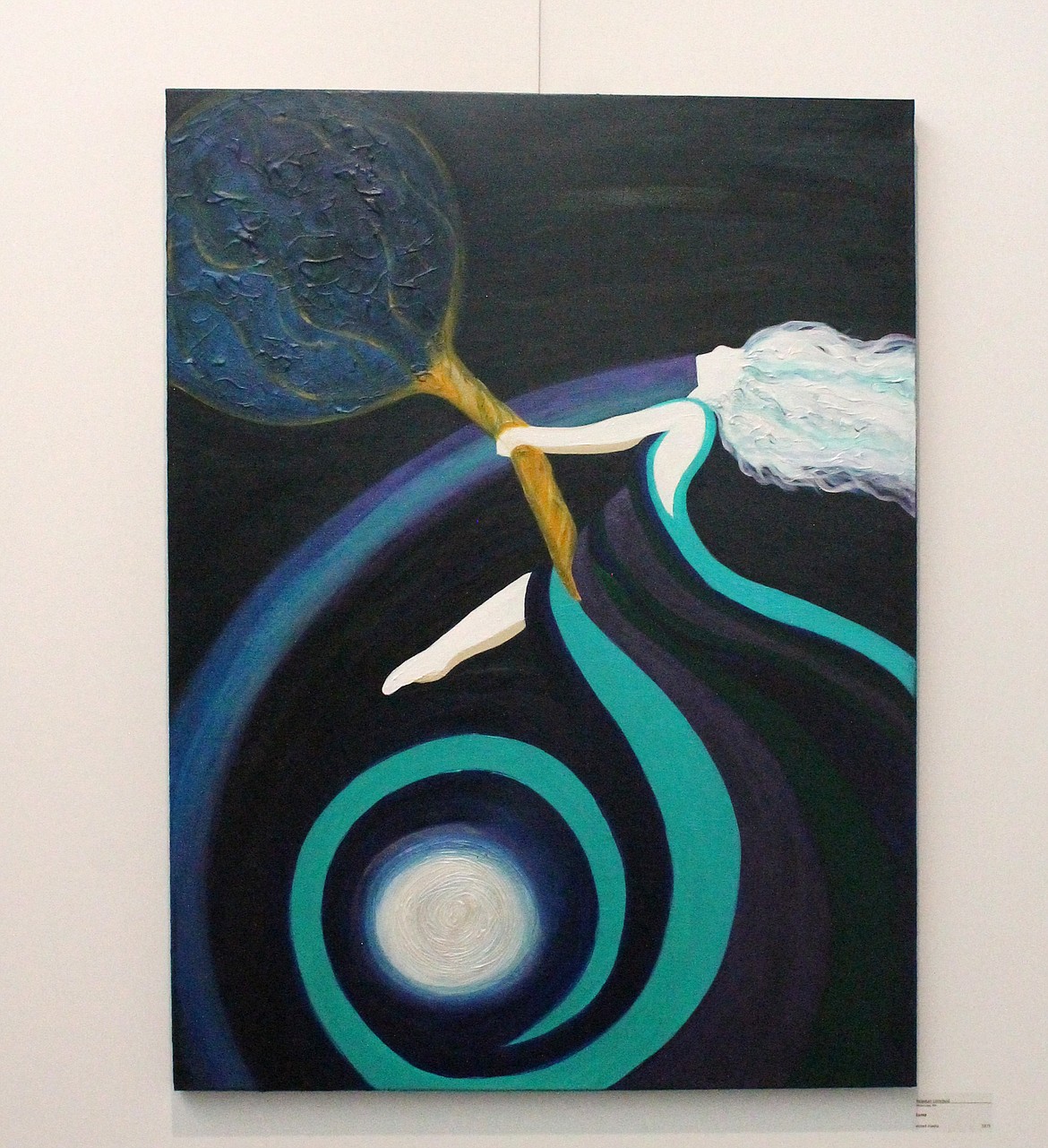 “Luna,” by Moses Lake artist Rebekah Littlefield, is on display at the Moses Lake Museum & Art Center’s Members Exhibition. The mixed-media piece was inspired by a song, according to a social media post by Littlefield.