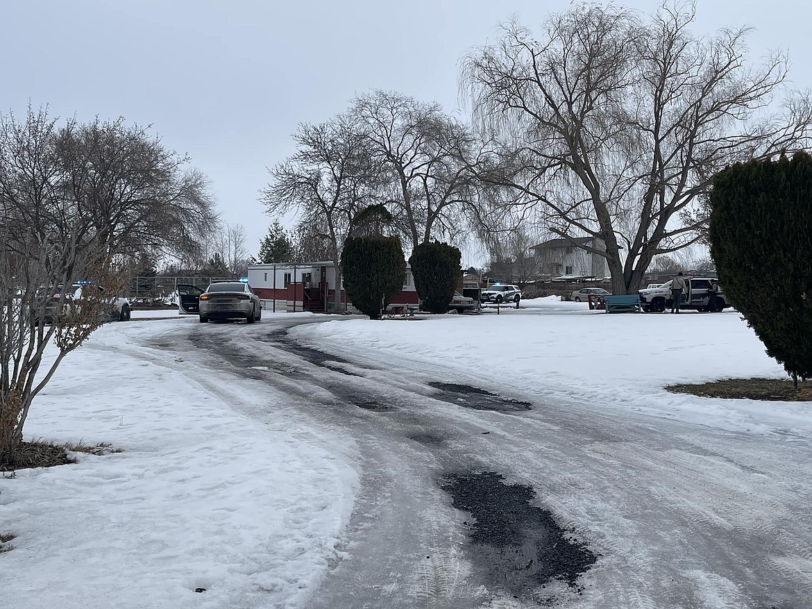 A suspect with a felony warrant barricaded himself for more than two hours in this Soap Lake residence Friday afternoon. The suspect, who was not identified at press time, was taken into custody without incident.