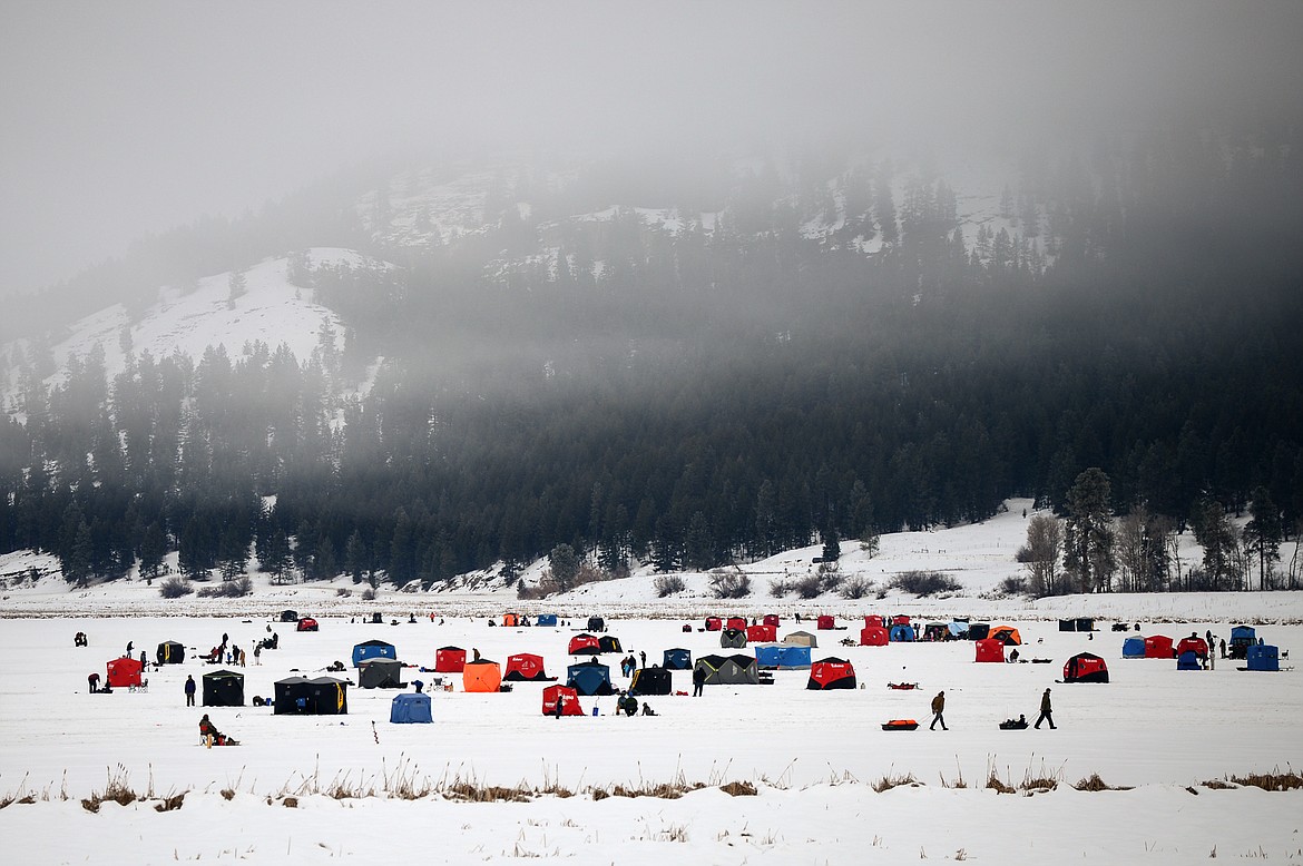 Ice fishing tents spread out across Smith Lake at the Sunriser Lions Family Ice Fishing Derby in Kila on Saturday, Jan. 7. (Casey Kreider/Daily Inter Lake)