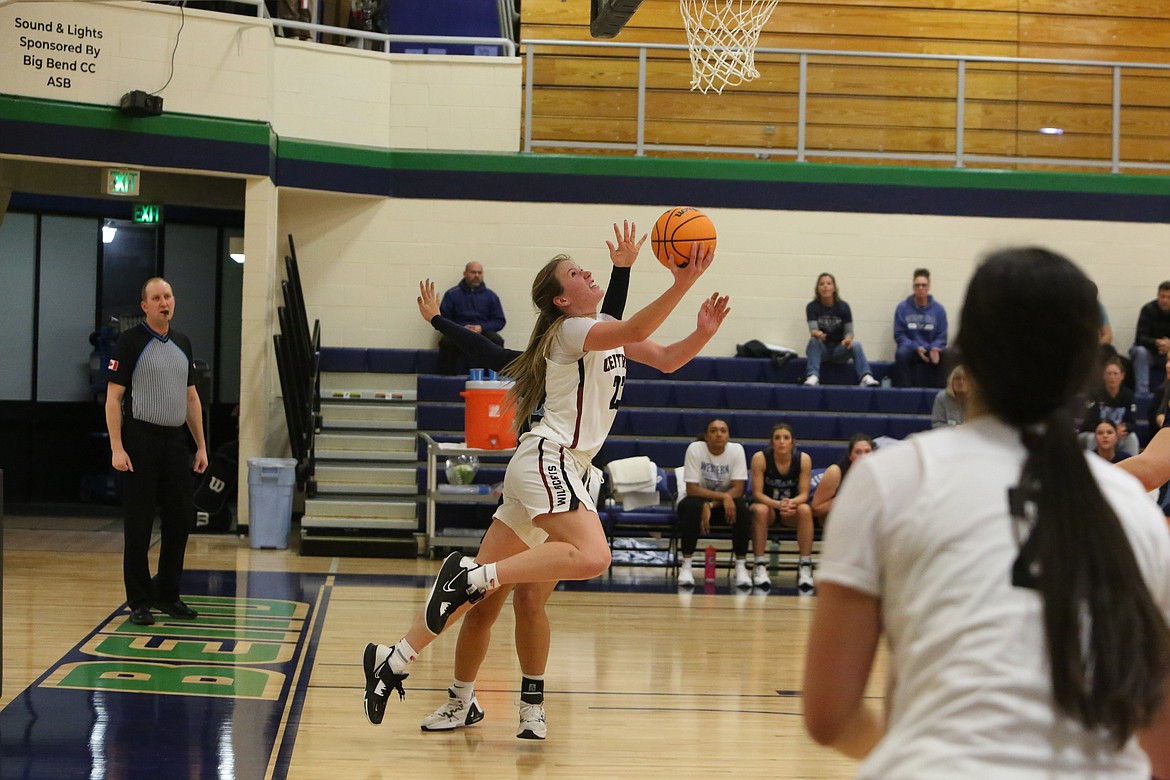 Central Washington center Samantha Bowman goes up for a reverse layup during the Wildcat’s 82-70 loss to Western Washington on Thursday.