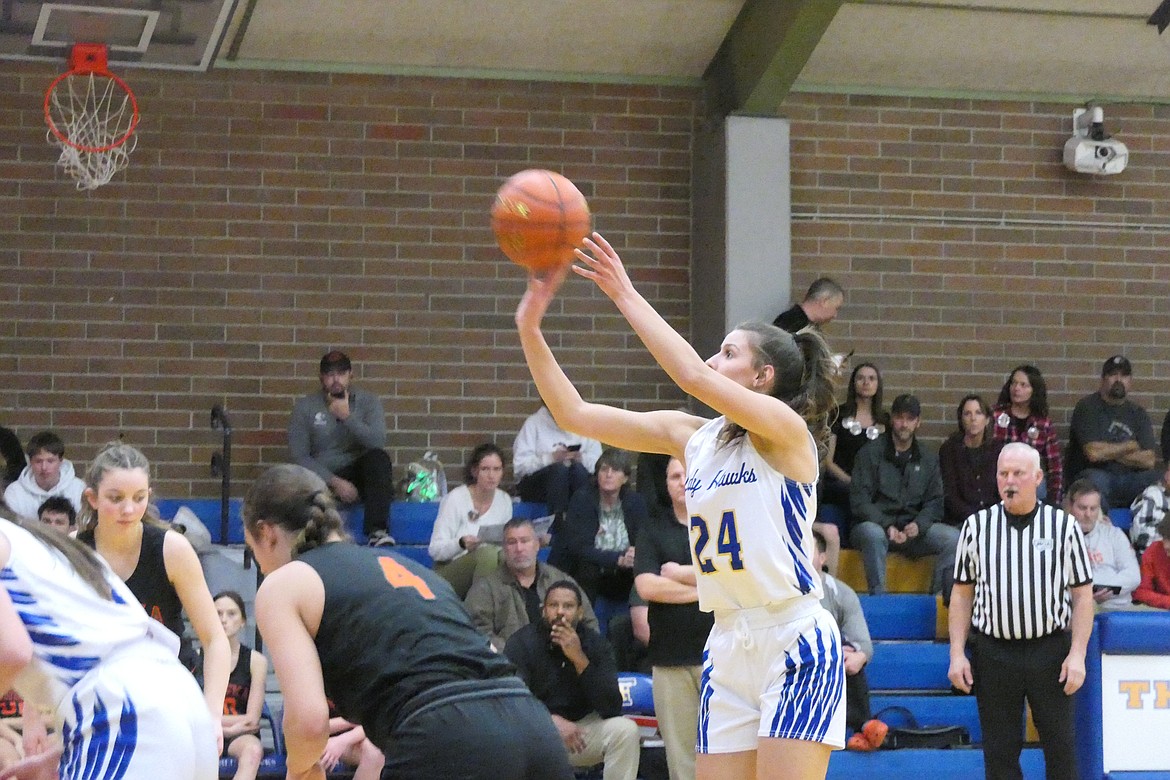 Senior Lady Hawks forward Avery Burgess shoots a free throw Saturday night in Thompson Falls' win over Eureka. (Chuck Bandel/Valley Press)