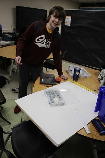 7th grade student Caiden Delaney sketches out each individual part needed in a story-board format of what will be required for the ‘robot’ he is creating. It’s one of the first steps of the construction phase. (Photo provided)